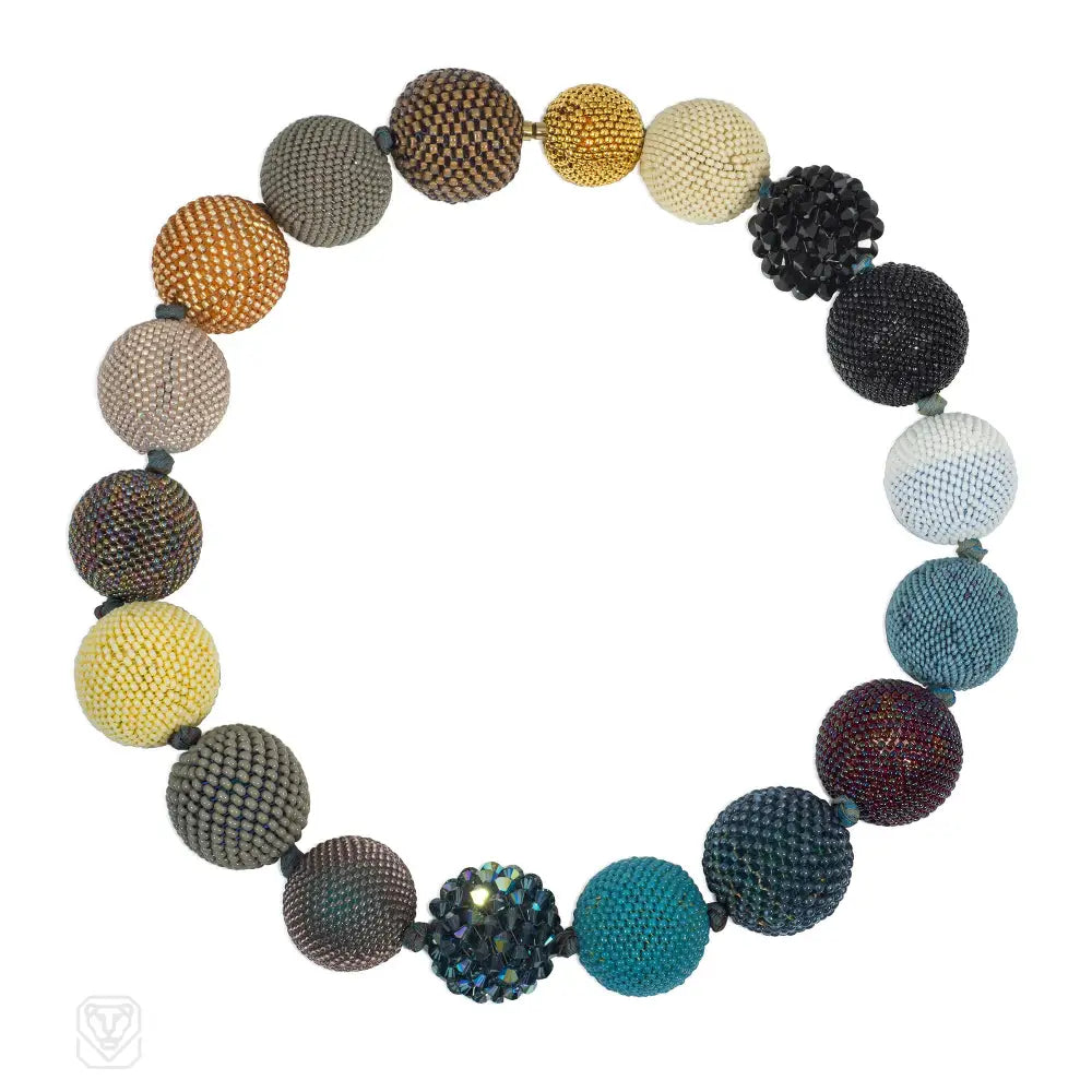 Long Gold Necklace-A multi-colored beaded ball necklace comprising 18 spheres w...